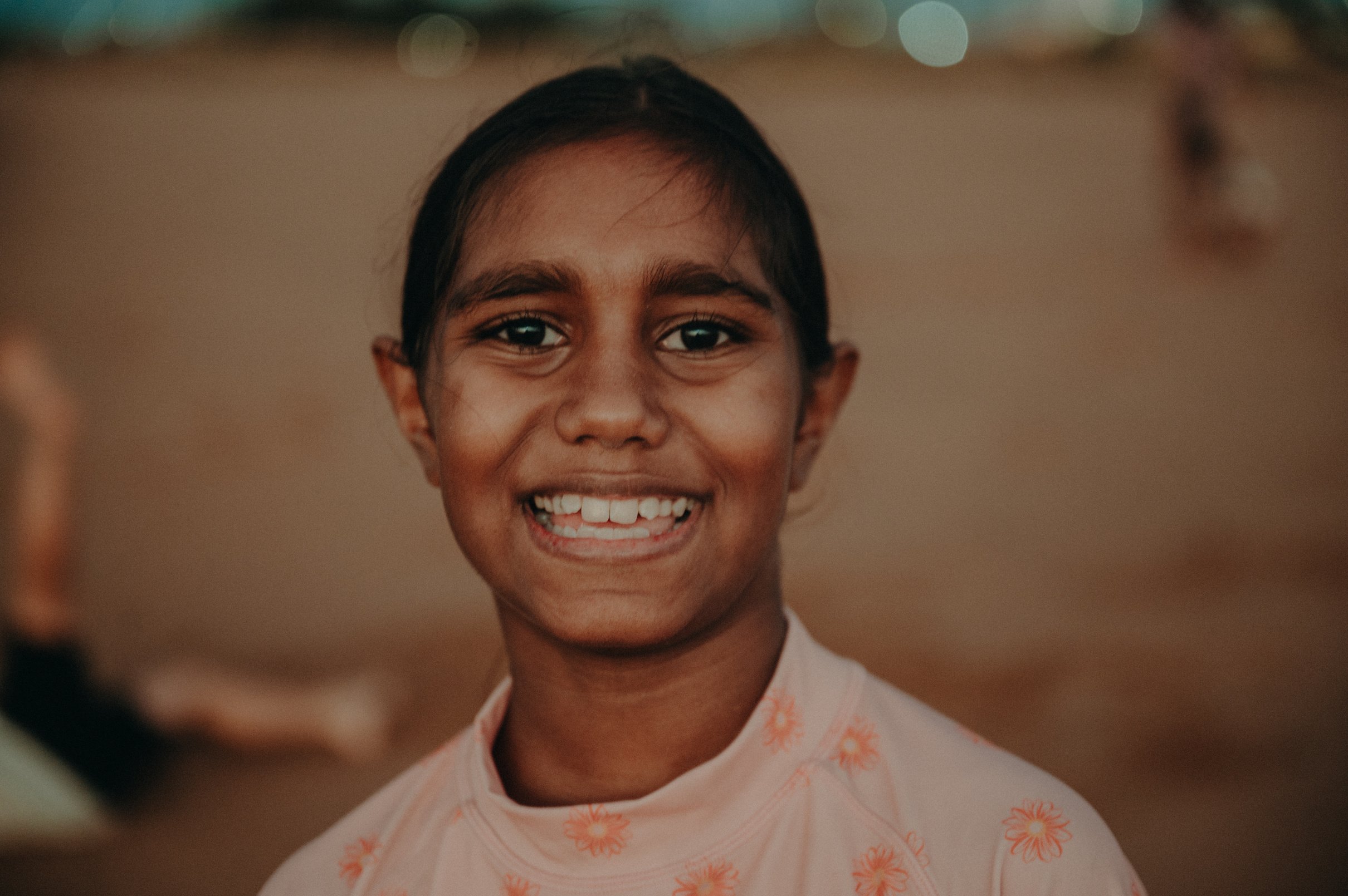 Portrait of a Smiling Girl Outdoors
